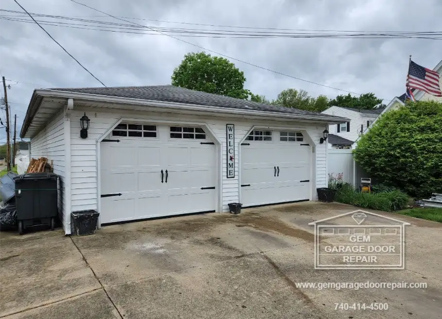 Adorable Carriage Doors with 6-Pane Glass (Photo 1)