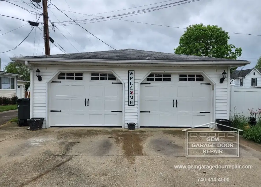 Adorable Carriage Doors with 6-Pane Glass (Photo 3)