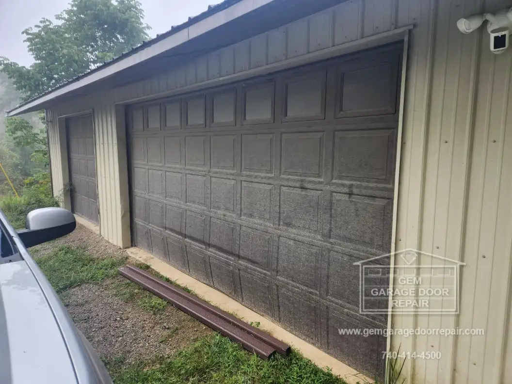 Aesthetic & Functional Garage Door Upgrade (Photo 1)