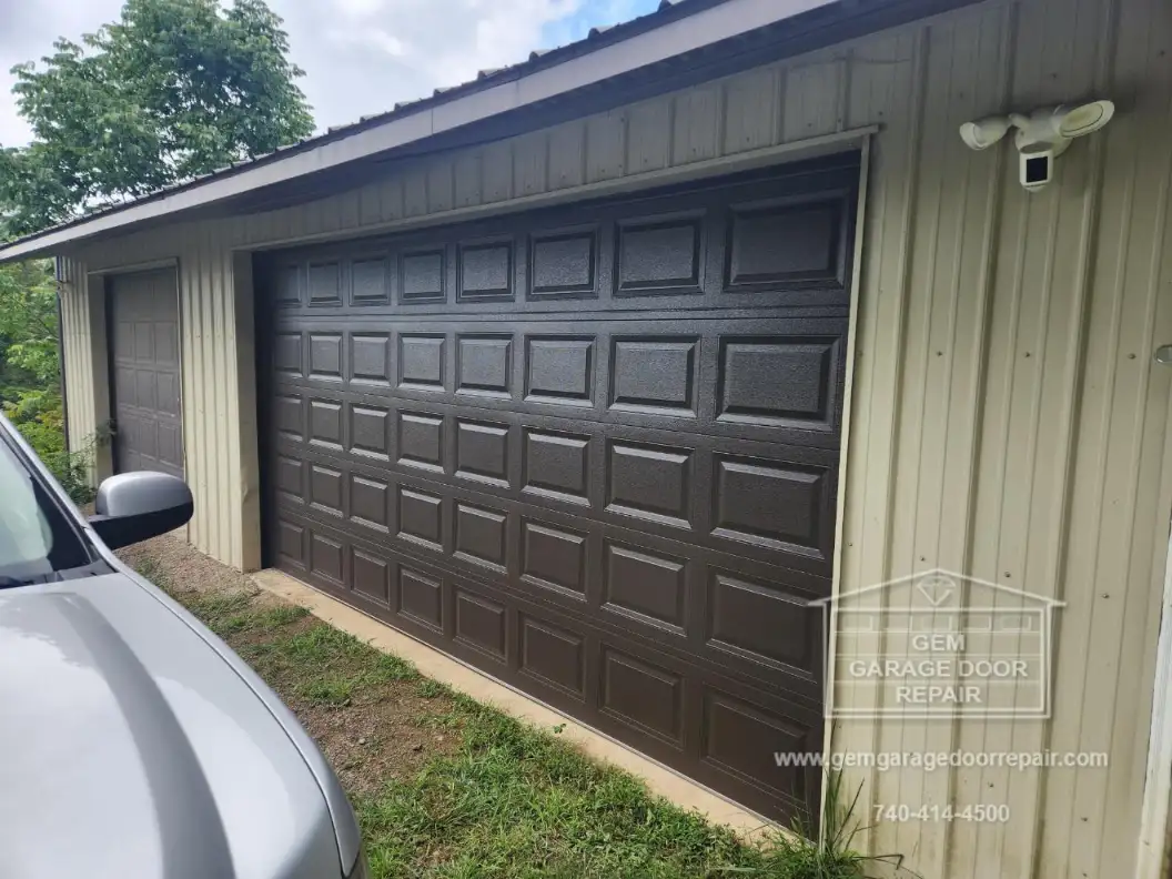 Aesthetic & Functional Garage Door Upgrade (Photo 2)