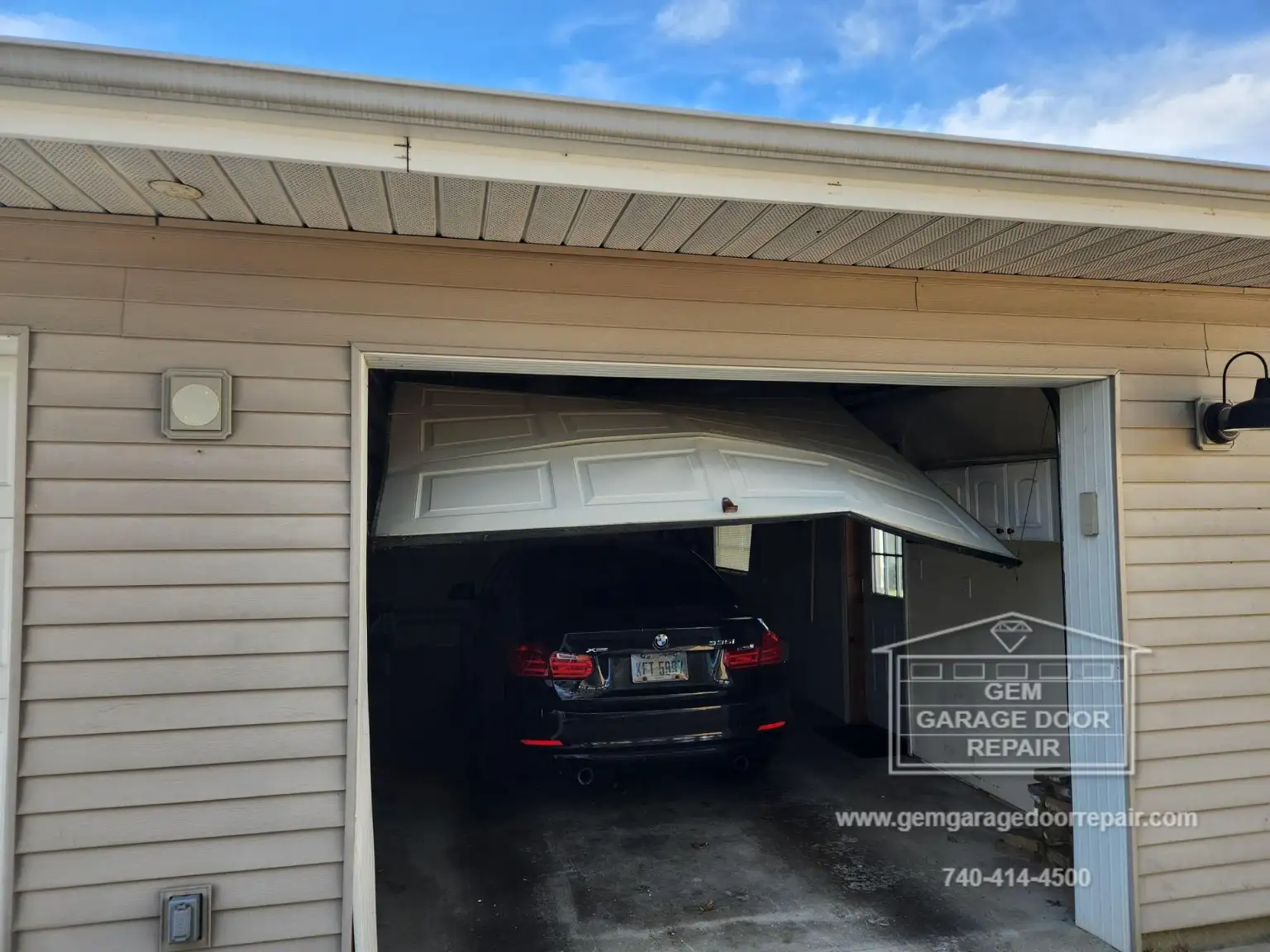 Amazing Repair on Car-Struck Garage Door (Photo 1)