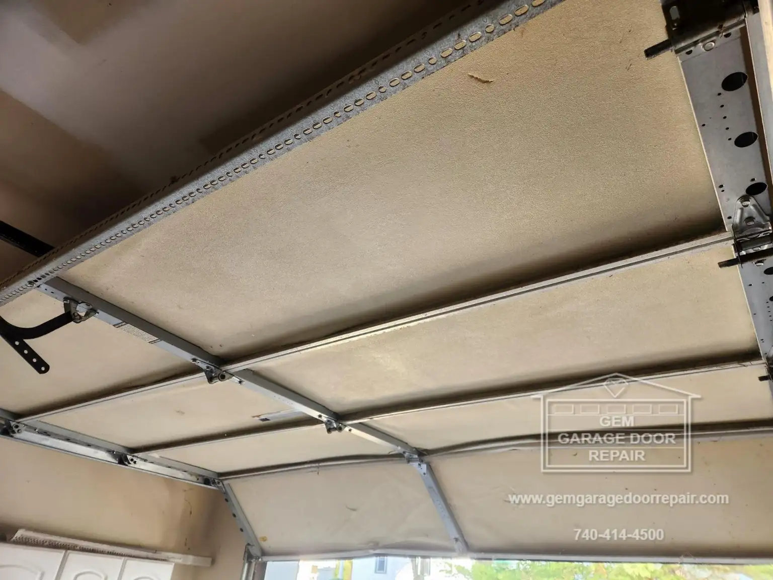 Amazing Repair on Car-Struck Garage Door (Photo 2)