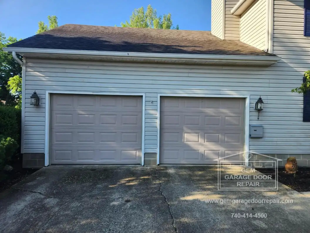 Bold Bronze Carriage House Door Upgrade (Photo 2)