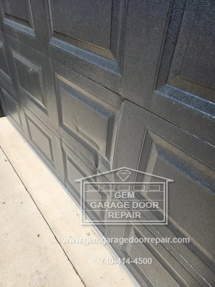 Repairing a Damaged Garage Door when a Replacement is not in the Budget