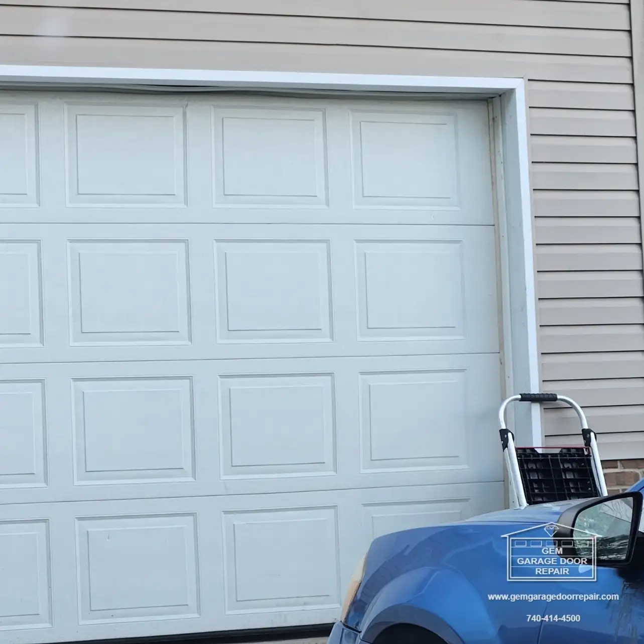 Emergency Fix: Garage Door Off the Tracks (Photo 1)