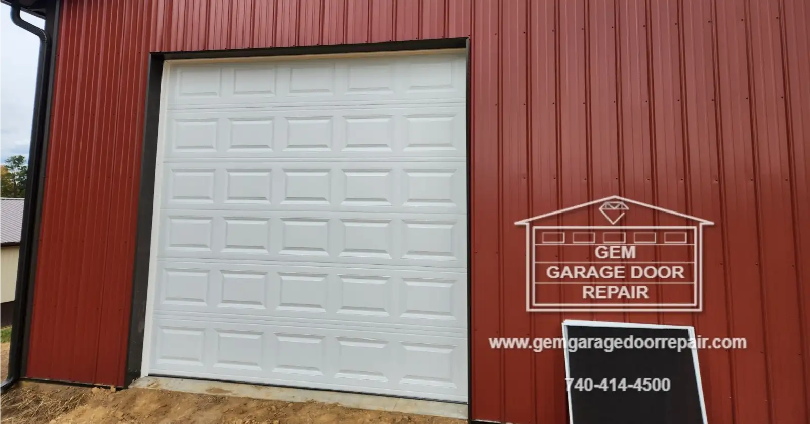 Installing 10x10 Manual Drive-Through Doors (Photo 1)