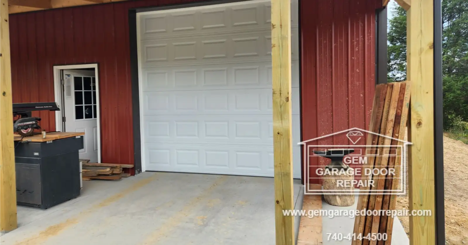 Installing 10x10 Manual Drive-Through Doors (Photo 2)