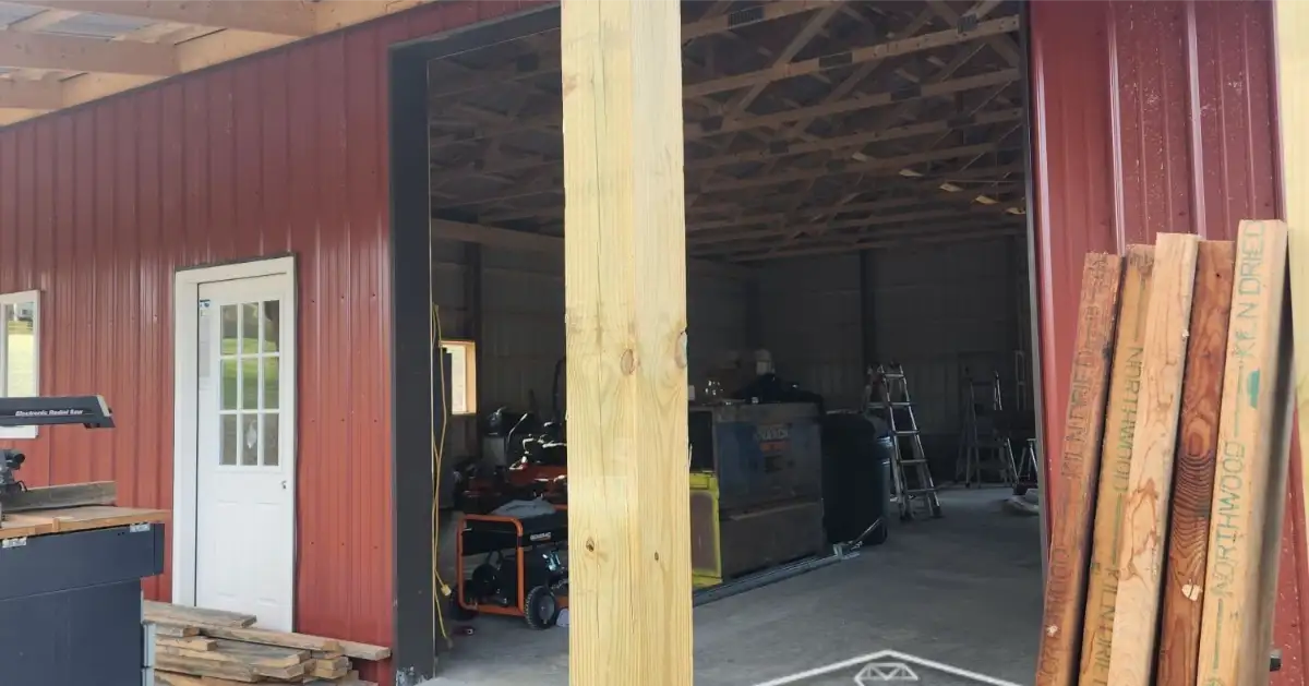 Installing 10x10 Manual Drive-Through Doors (Photo 3)