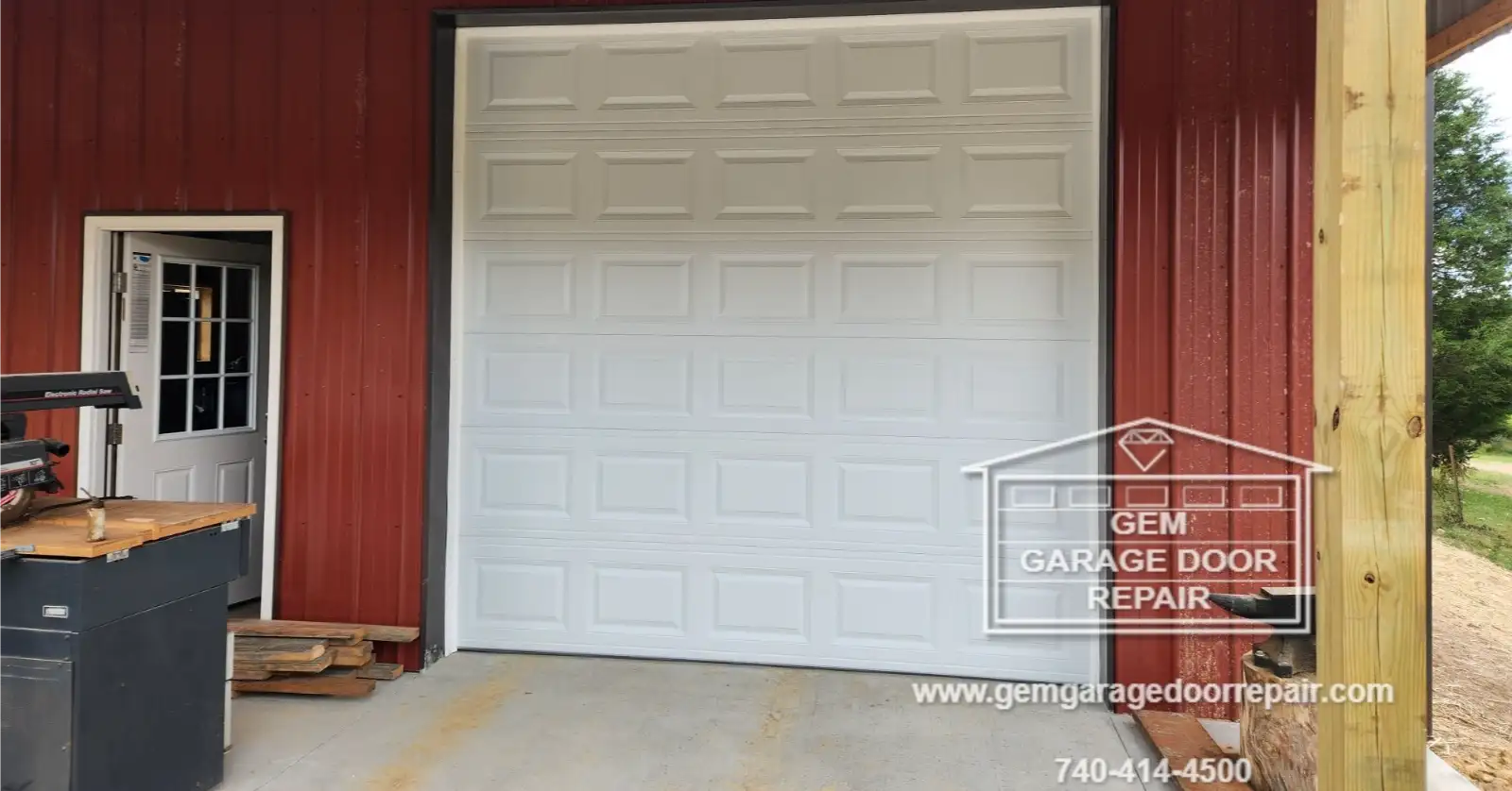 Installing 10x10 Manual Drive-Through Doors (Photo 4)