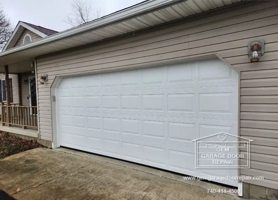 Replacing a Hit & Falling Garage Door (Photo 1)