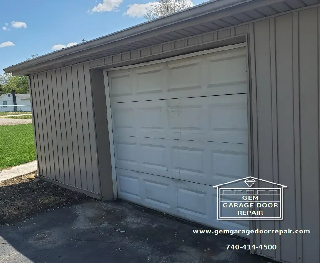 Tired Door to Insulated Steel & Belt Opener (Photo 1)