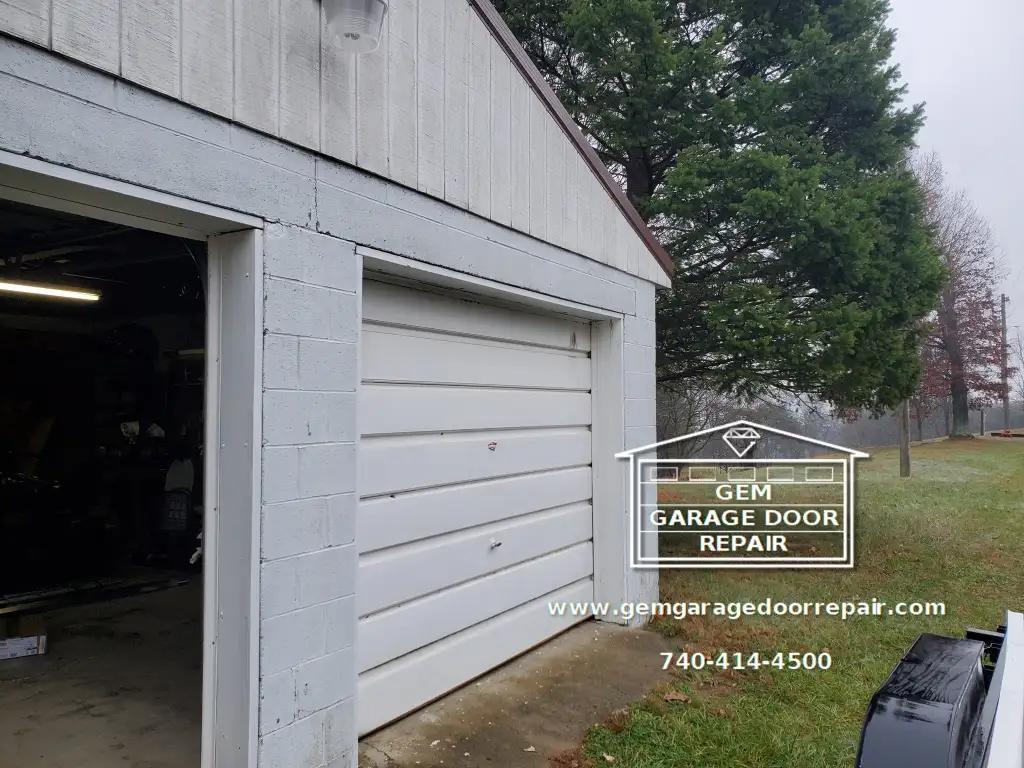 Unsticking & Replacing Old Garage Doors (Photo 1)