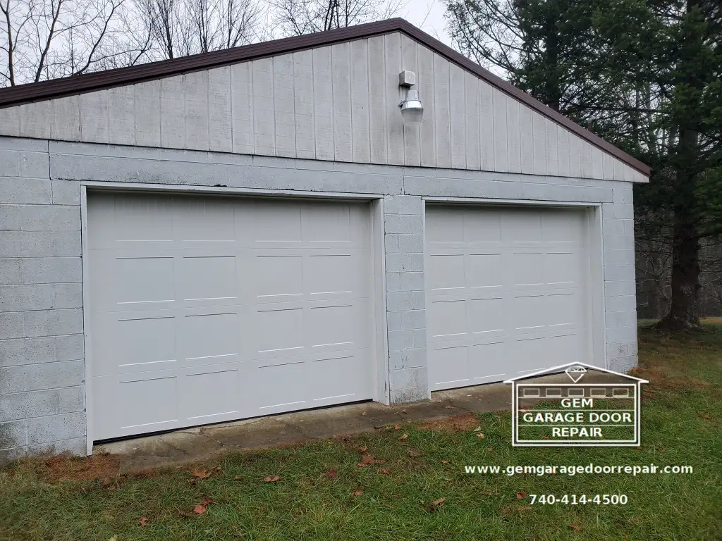 Unsticking & Replacing Old Garage Doors (Photo 2)