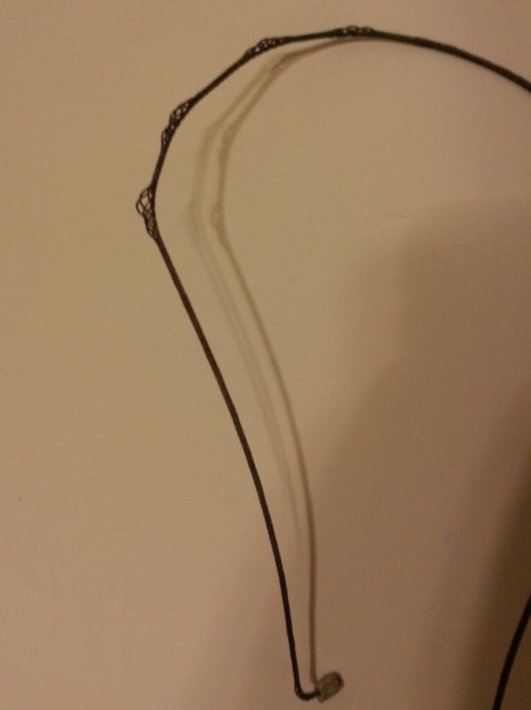 Damaged garage door cable about ready to break