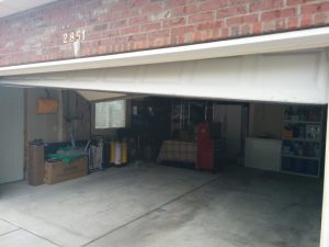 Garage door damaged because of bad rollers